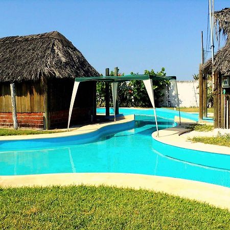 Отель Cabanas Pie De La Cuesta Коюка Экстерьер фото
