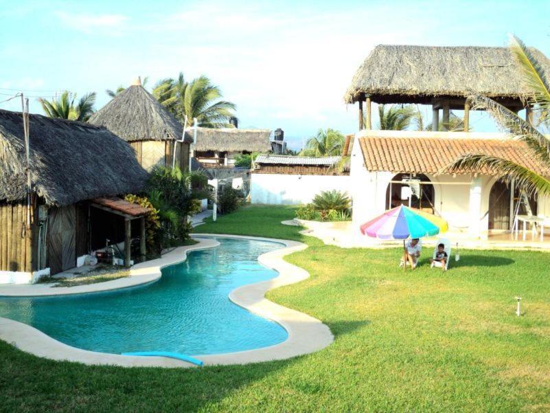 Отель Cabanas Pie De La Cuesta Коюка Номер фото