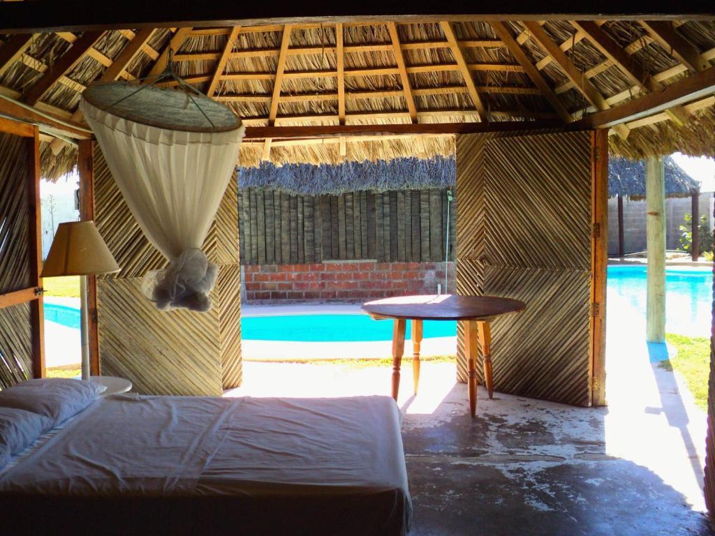 Отель Cabanas Pie De La Cuesta Коюка Номер фото