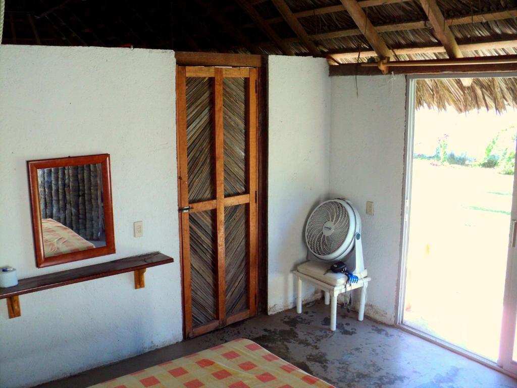 Отель Cabanas Pie De La Cuesta Коюка Номер фото