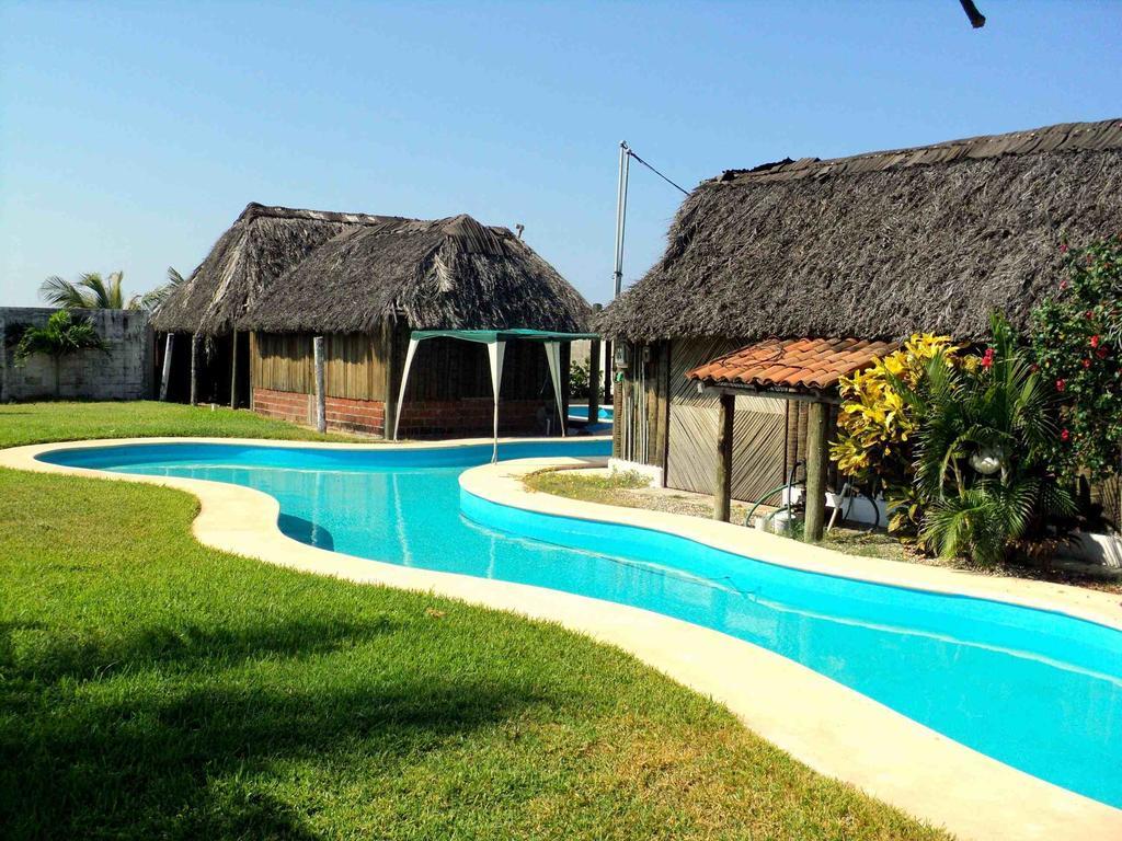 Отель Cabanas Pie De La Cuesta Коюка Экстерьер фото