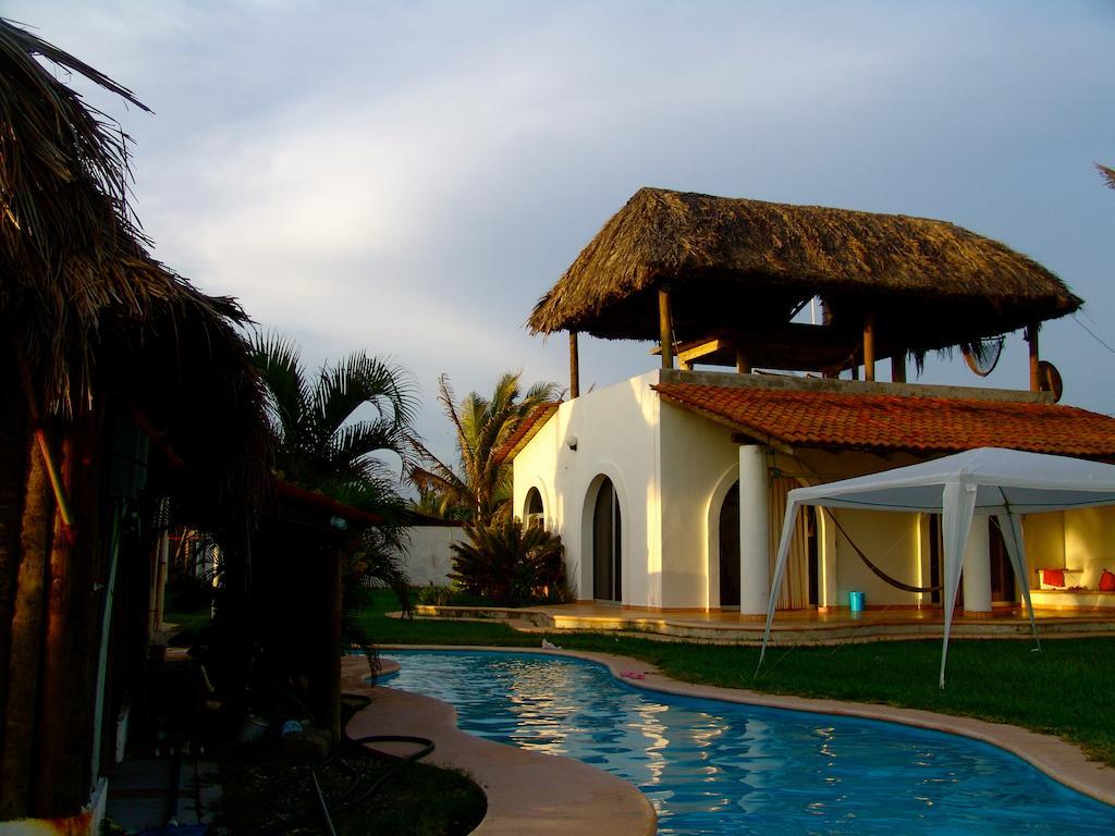 Отель Cabanas Pie De La Cuesta Коюка Экстерьер фото